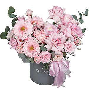 Gerbera pink - 7, Peony rose pink 'OHara' - 3, Ranunculus Pink - 3, Peony sprayrose - 3, Pink carnation - 13, Pink Lisianthus (Eustoma) - 2, Round flower box medium, Oasis, Eucalyptus, Ribbon, Limonium (1 pc.)
