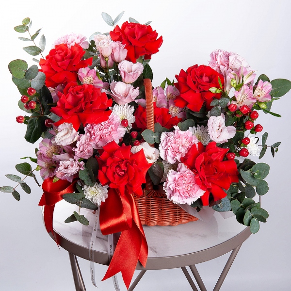 Red rose Nina 50 cm - 9, Pink Lisianthus (Eustoma) - 3, Baltica White Spray Chrysanthemum - 1, Pink carnation - 7, Alstromeria white, soft pink - 6, Small Basket, Oasis, Hypericum, Eucalyptus, Ribbon
