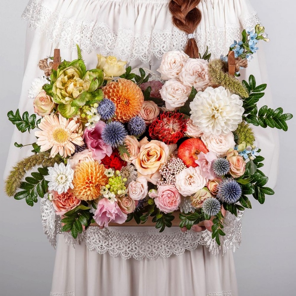 Orange Dahlia - 3, Rose Veggie 50 cm - 1, Peony sprayrose - 2, Spray rose: white, cream, light pink 50 cm - 1, Pink Lisianthus (Eustoma) - 2, Gerbera white - 5, Pink-orange rose Phoenix 50 cm - 2, Wooden pot, Oasis, Pistachio, Ozotamnus, Ornithogalum, Oksipetalum, Eryngium, Veronica spray, Celosia, Nutan, Apple, 1 pc.