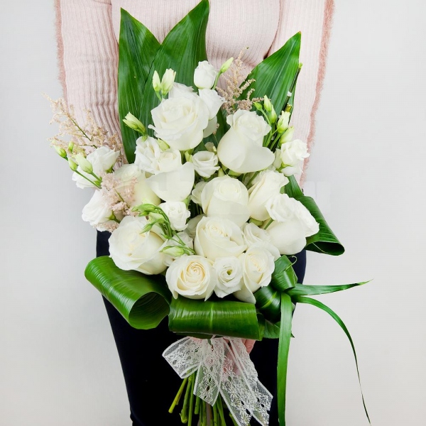 White rose 50 cm - 16, lisianthus - 8, Astilbe, Aspidistra (1 pc.), Ribbon