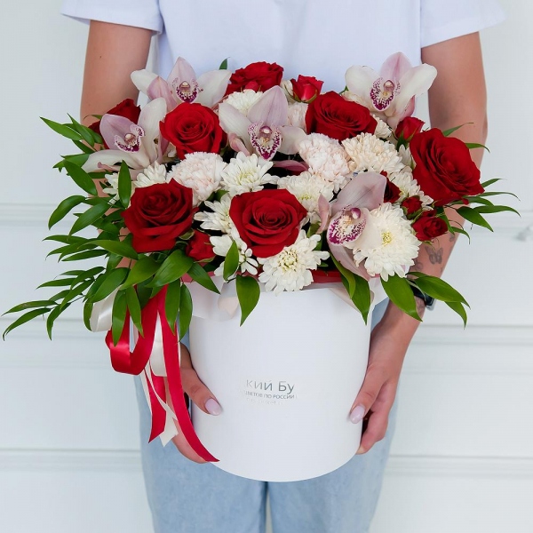 Red rose 50 cm - 11, Pink Cymbidium Orchid Bud - 7, Baltica White Spray Chrysanthemum - 4, Spray rose: red 50 cm - 3, Carnation white, cream - 7, Round flower box medium, Flask for orchids, Oasis, Ruscus italian, Ribbon