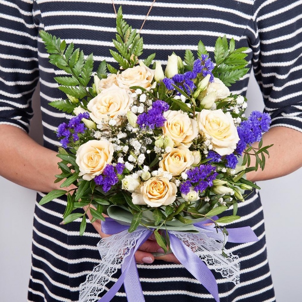 Spray rose: white, cream, light pink 50 cm - 3, Gypsophila - 1, lisianthus - 1, Blue Statice, Oasis, Pistachio, Fern (1 pc.), Wrapping Paper
