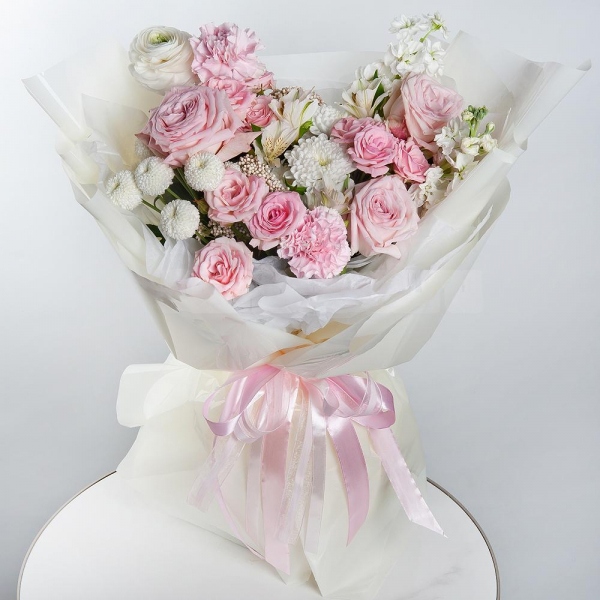 Ranunculus White - 1, Peony rose pink 'OHara' - 3, White Matthiola - 2, Bright pink spray rose mix, 50 cm - 3, Pink carnation - 9, Alstromeria white, soft pink - 2, Newton White Spray Chrysanthemum - 1, Baltica White Spray Chrysanthemum - 1, Ozotamnus, Wrapping Paper