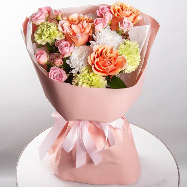 Pink-orange rose Phoenix 50 cm - 3, Baltica White Spray Chrysanthemum - 1, Bright pink spray rose mix, 50 cm - 3, Green carnation - 7, Wrapping Paper
