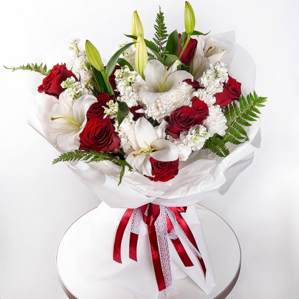 Rose Red 50 cm Ecuador - 21, Baltica White Spray Chrysanthemum - 2, White Matthiola - 11, Lilies - 2, Fern (1 pc.), Wrapping Paper