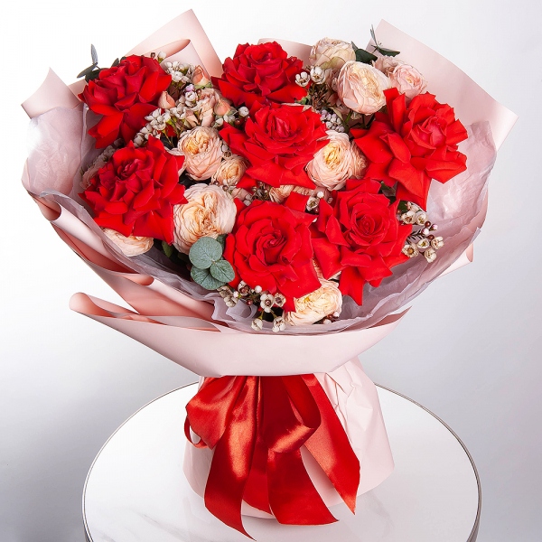 Red rose Nina 50 cm - 11, Spray rose: white, cream, light pink 50 cm - 9, Waxflower (1 pc.), Wrapping Paper, Eucalyptus