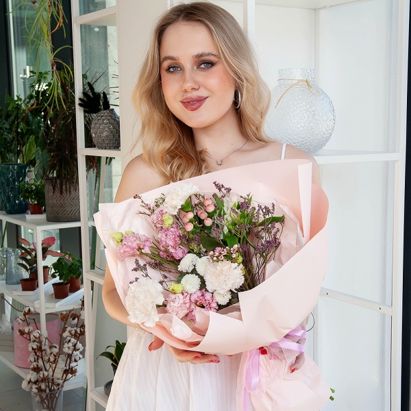 Carnation white, cream - 7, Newton White Spray Chrysanthemum - 1, Alstromeria white, soft pink - 2, Pink Lisianthus (Eustoma) - 2, Hypericum, Limonium (1 pc.), Waxflower (1 pc.), Wrapping Paper