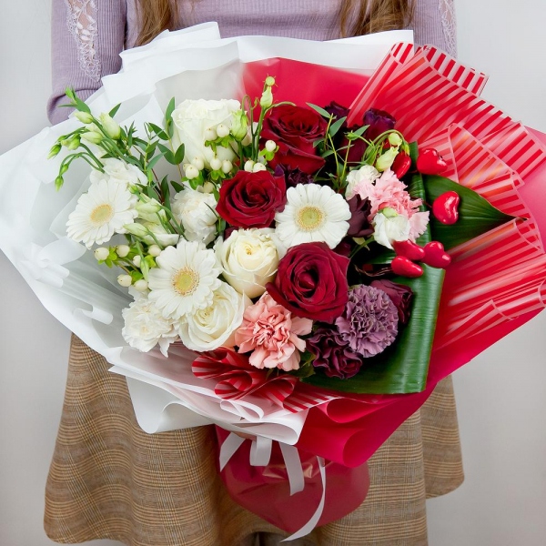 Gerbera white - 5, lisianthus - 3, Red rose 50 cm - 4, White rose 50 cm - 3, Lilac carnation - 1, Spray rose: red 50 cm - 4, Pink carnation - 3, Carnation white, cream - 3, Hypericum, Eucalyptus parvifolia (1 pc.), Aspidistra (1 pc.), Decorative element small, Wrapping Paper