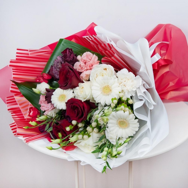 Gerbera white - 5, lisianthus - 3, Red rose 50 cm - 4, White rose 50 cm - 3, Lilac carnation - 1, Spray rose: red 50 cm - 4, Pink carnation - 3, Carnation white, cream - 3, Hypericum, Eucalyptus parvifolia (1 pc.), Aspidistra (1 pc.), Decorative element small, Wrapping Paper
