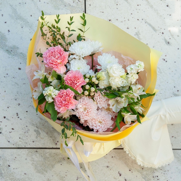 Pink carnation - 5, White Matthiola - 2, Baltica White Spray Chrysanthemum - 2, Alstromeria white, soft pink - 3, lisianthus - 1, Hypericum, Eucalyptus parvifolia (1 pc.), Wrapping Paper