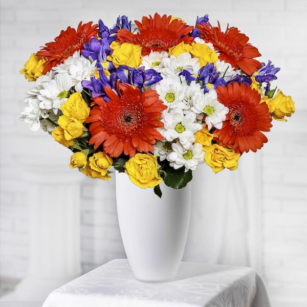 Spray rose: yellow, orange 50 cm - 13, Bacardi White Spray Chrysanthemum - 8, Gerbera daisies - 7, Irises - 13, Jute 1 meter, Ribbon