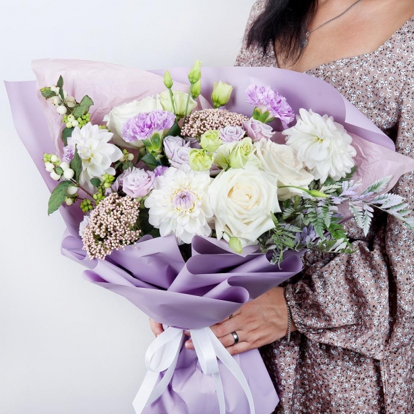 White rose 50 cm - 5, White Dahlia - 3, Lilac carnation - 5, Spray rose: white, cream, light pink 50 cm - 2, lisianthus - 2, Ozotamnus, Fern (1 pc.), Symphoricarpos, Wrapping Paper