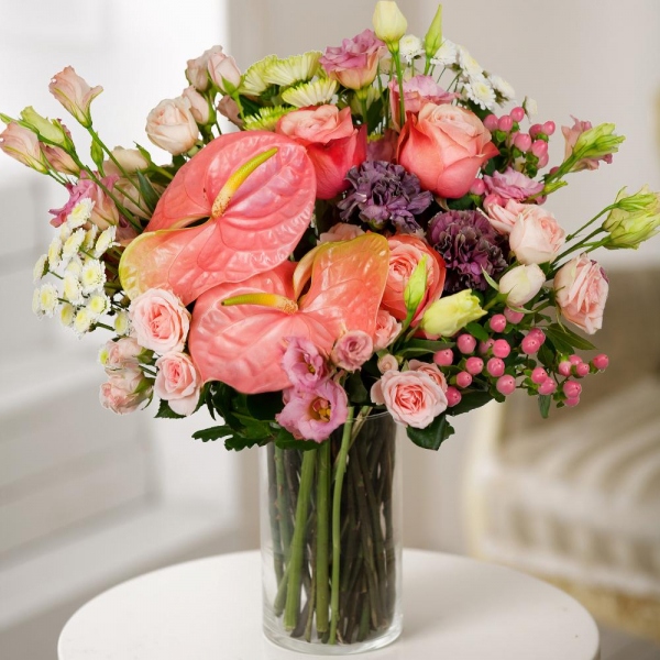 Pink Lisianthus (Eustoma) - 6, Athos poms Stallion - 3, Lilac carnation - 4, Bright pink spray rose mix, 50 cm - 9, Pink cut anthurium - 2, Peony rose Kahala 50 cm - 5, Hypericum, Aspidistra (1 pc.), Wrapping Paper