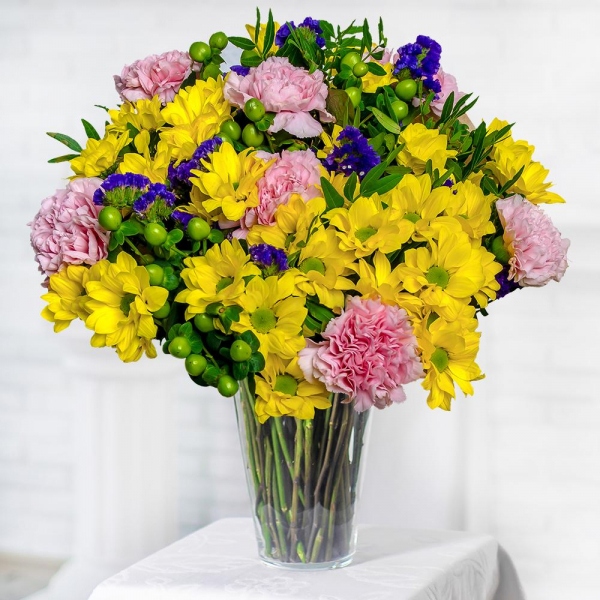 Bacardi Yellow Spray Chrysanthemum - 10, Pink carnation - 11, Blue Statice, Hypericum, Pistachio, Wrapping Paper, Ribbon