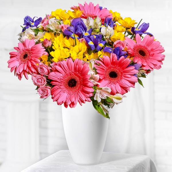 Bright pink spray rose mix, 50 cm - 8, Gerbera pink - 9, Bacardi Yellow Spray Chrysanthemum - 7, Irises - 13, Alstromeria white, soft pink - 7, Sisal, Ribbon