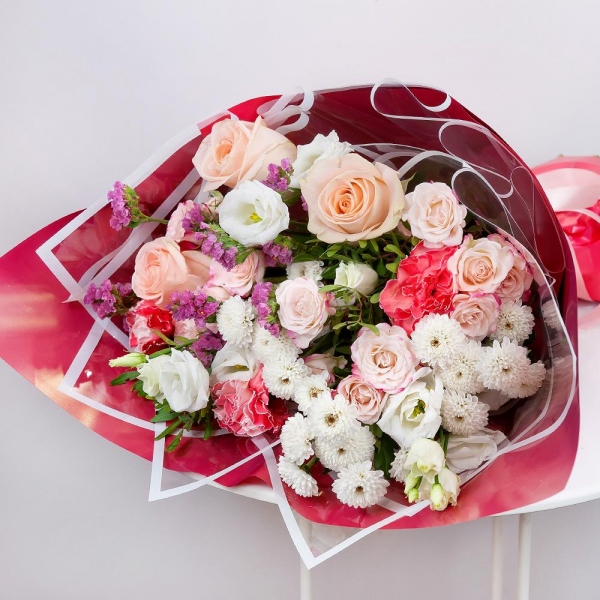 Athos poms Stallion - 4, Spray rose: white, cream, light pink 50 cm - 4, Rose Cream 50 cm - 7, Pink carnation - 4, lisianthus - 1, Pink Statice, Pistachio, Wrapping Paper