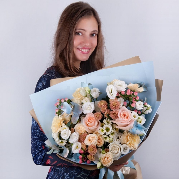 White rose 50 cm - 2, Rose Cream 50 cm - 4, Spray rose: white, cream, light pink 50 cm - 4, lisianthus - 4, Carnation white, cream - 5, Daisy poms Santini pink, purple - 4, Santini White Spray Chrysanthemum - 4, Hypericum, Eucalyptus Cinerea, Wrapping Paper
