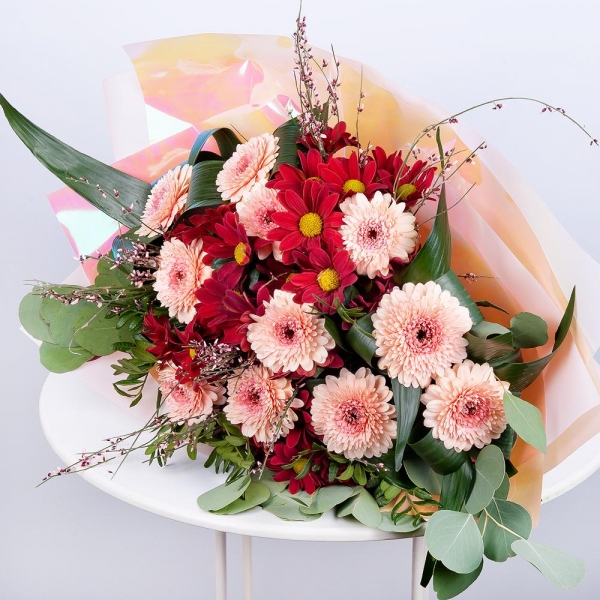 Gerbera pink - 13, Bacardi Red Spray Chrysanthemum - 5, Aspidistra (1 pc.), Eucalyptus Cinerea, Pistachio, Genista, Wrapping Paper, Ribbon