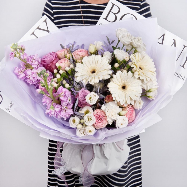 Gerbera white - 3, Pink rose 50 cm - 7, Peony sprayrose - 3, Carnation white, cream - 5, Matthiola Lilac - 2, lisianthus - 4, Hypericum, Pistachio, Wrapping Paper