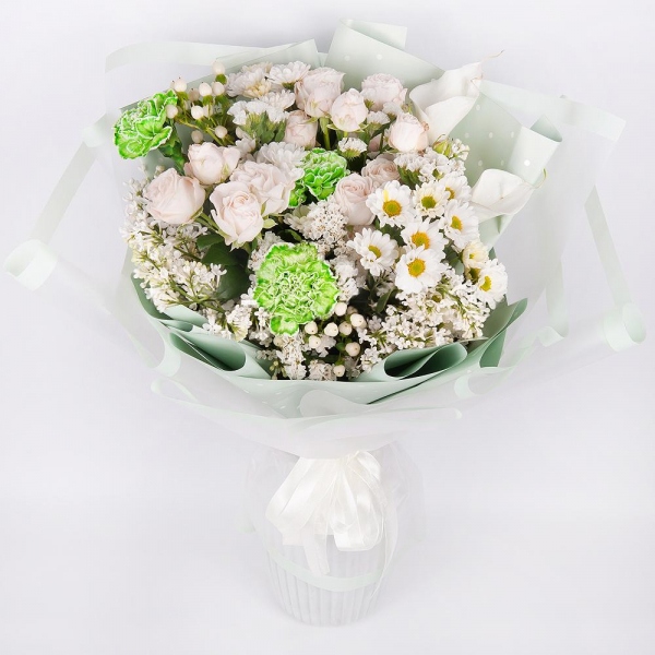 Green carnation - 5, Spray rose: white, cream, light pink 50 cm - 3, Santini White Spray Chrysanthemum - 4, Calla lilies - 2, White Lilac - 3, Hypericum, White statice, Wrapping Paper