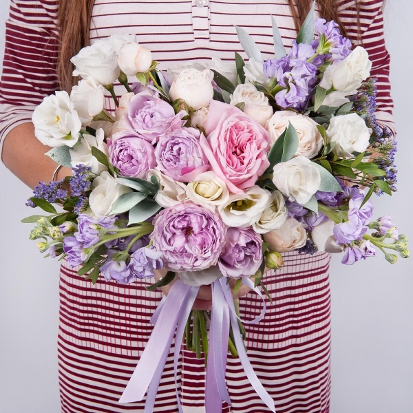 Peony rose pink 'OHara' - 1, Spray peony rose Lavander, 50 cm - 2, Spray rose: white, cream, light pink 50 cm - 8, lisianthus - 2, Matthiola Lilac - 5, Limonium (1 pc.), Ruscus, Pistachio, Ribbon