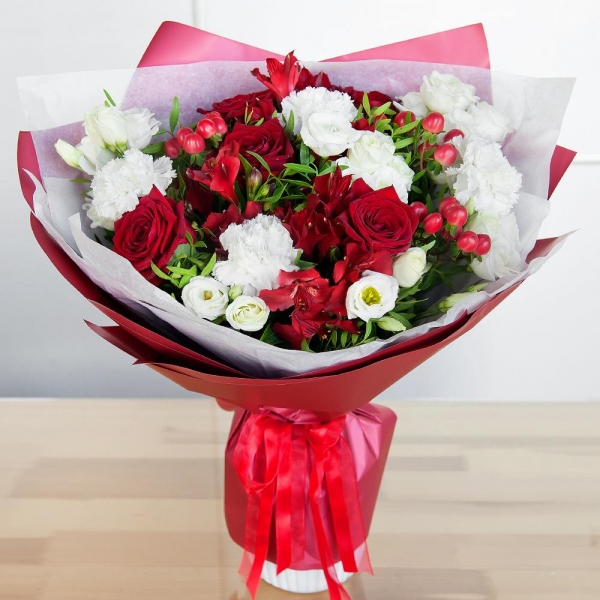 Red rose 50 cm - 7, lisianthus - 3, Alstromeria Red, Bright Pink - 3, Carnation white, cream - 6, Hypericum, Pistachio, Wrapping Paper