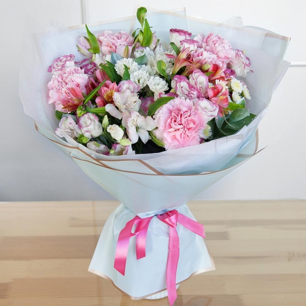 Pink carnation - 8, Alstromeria white, soft pink - 5, Santini White Spray Chrysanthemum - 3, Baltica White Spray Chrysanthemum - 3, Athos poms Stallion - 3, Pink Lisianthus (Eustoma) - 3, Ruscus, Wrapping Paper