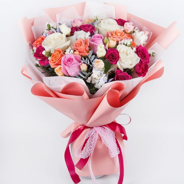 White rose 50 cm - 7, Pink rose 50 cm - 5, Spray rose: white, cream, light pink 50 cm - 4, lisianthus - 2, Bright pink spray rose mix, 50 cm - 4, Spray rose: yellow, orange 50 cm - 3, White statice, Pistachio, Wrapping Paper