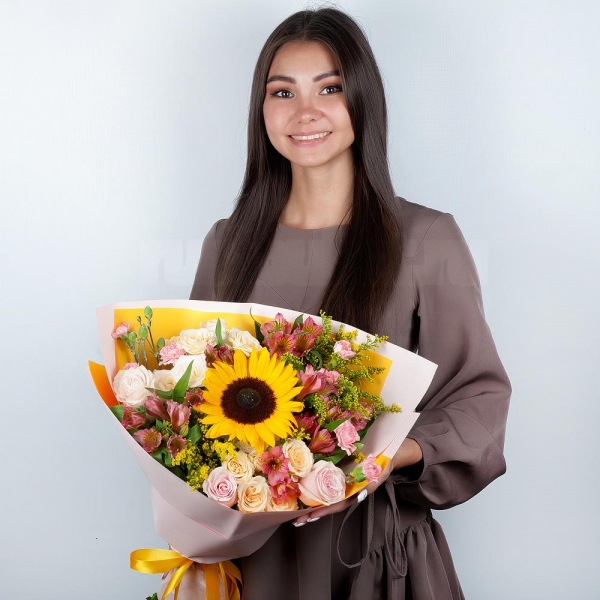 Sunflower - 1, Spray rose: white, cream, light pink 50 cm - 2, Pink rose 50 cm - 4, Pink spray carnation - 4, Alstromeria Red, Bright Pink - 6, Baltica White Spray Chrysanthemum - 1, Solidago (1 pc.), Wrapping Paper