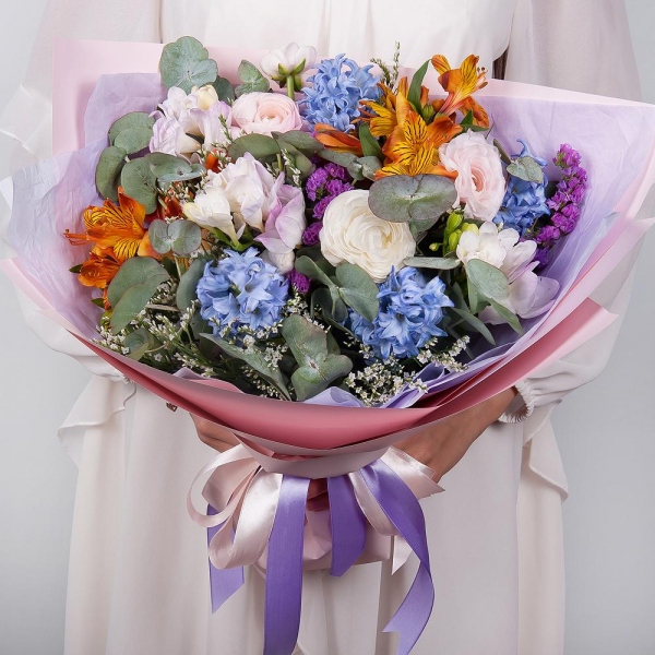 Blue Hyacinth - 5, Freesia - 5, Ranunculus Pink - 3, Alstromeria Yellow, Orange - 6, Limonium (1 pc.), Blue Statice, Eucalyptus, Wrapping Paper